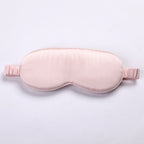 3d pink silk eye mask on a light gray background