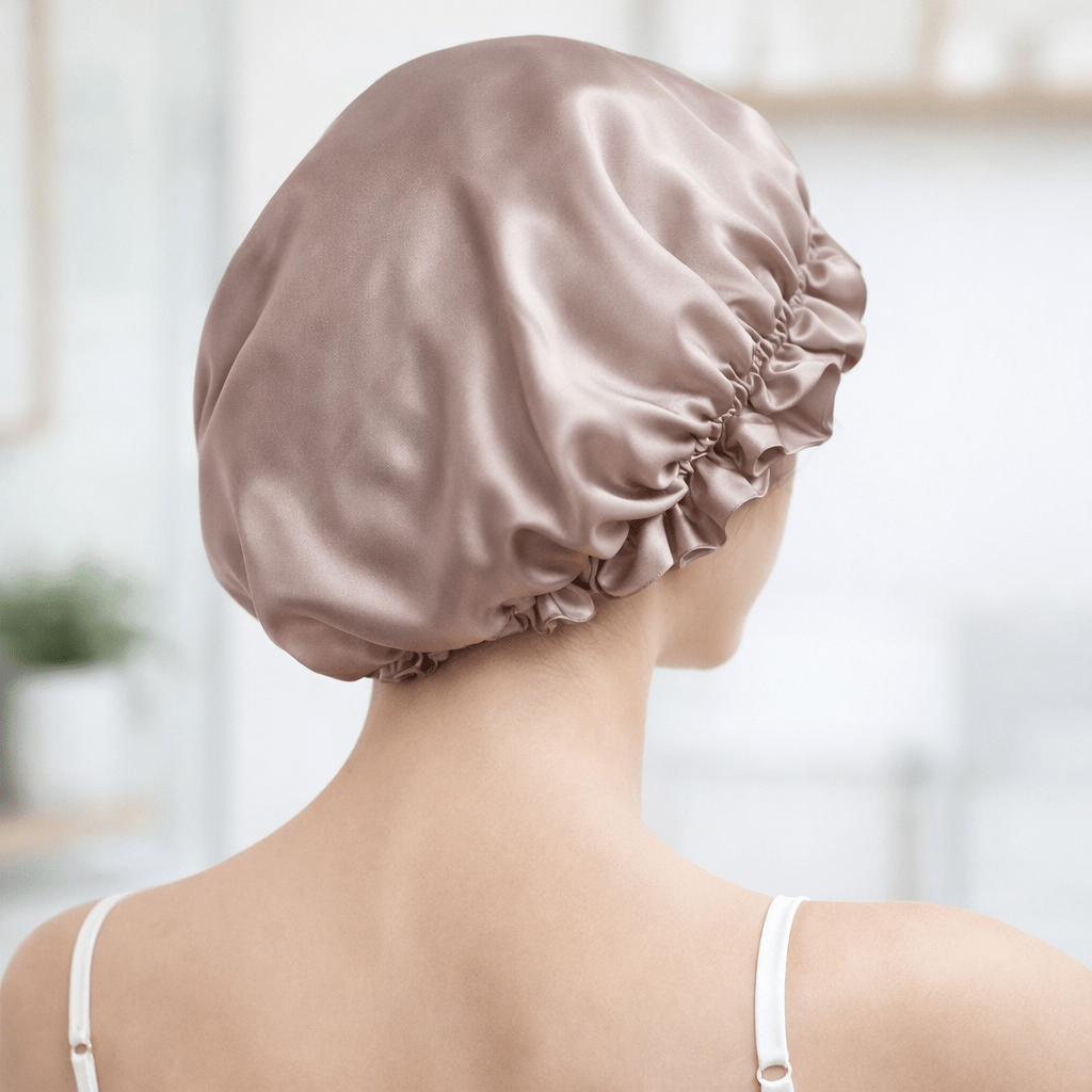 Back view of woman wearing a silk bonnet in a blurred indoor setting