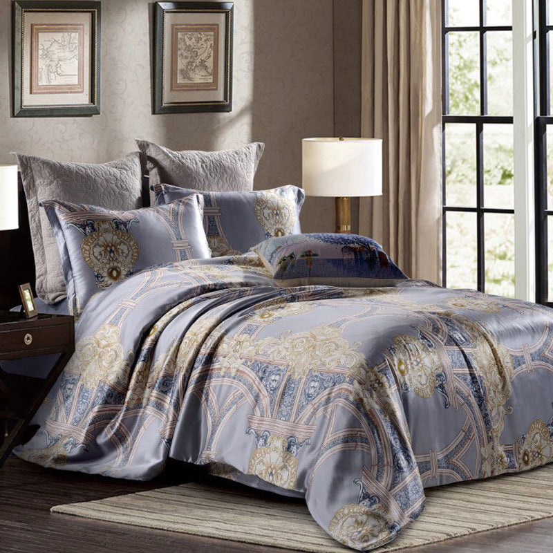 Bedroom with patterned silk duvet cover set and decorative pillows