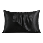 Black silk pillowcase on a white background