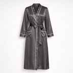 Brown silk robe with white piping on a light gray background