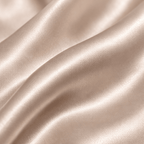 Close-up of beige silk fabric with soft folds