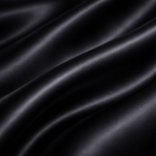 Close-up of black silk fabric with folds