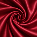 Close-up of red silk fabric with a swirl pattern