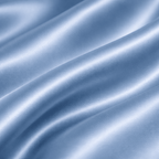 Close-up of sky blue silk fabric with ripples