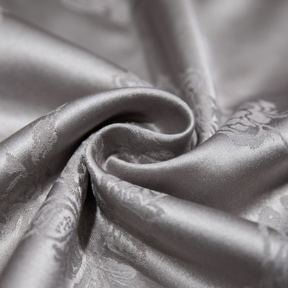 Close-up of textured silk fabric with intricate patterns
