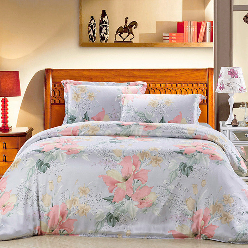 Floral silk duvet cover set on a bed with wooden headboard and nightstands.