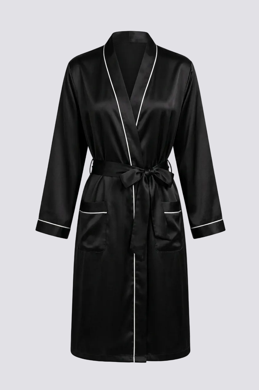 Black silk robe with white piping on a light gray background