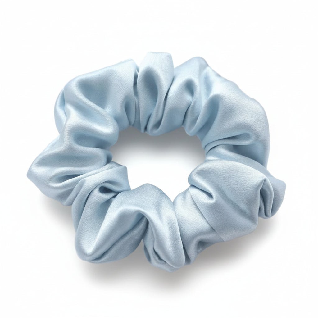 Light blue scrunchie on a white background