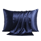 Navy blue silk pillowcase on a light gray background