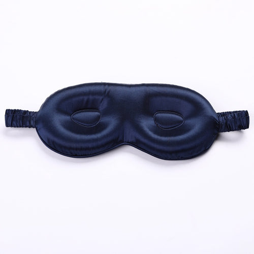 Navy blue sleep mask on a white background