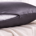 Plant gray silk pillowcase with zipper on a textured surface