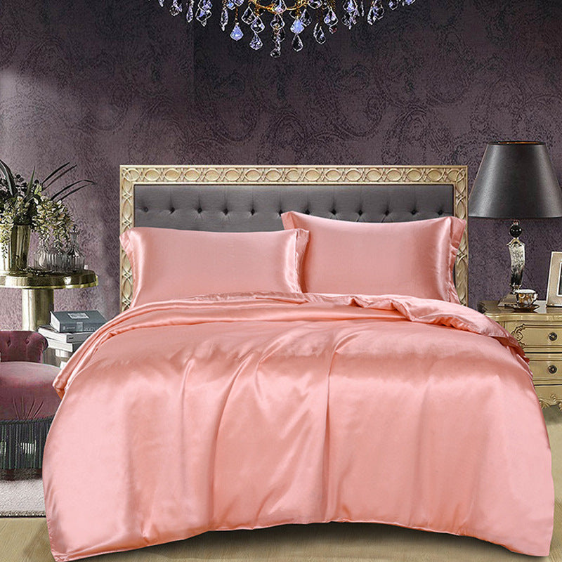 Watermelon red silk duvet cover on a bed in a stylish bedroom with purple walls and decorative elements.