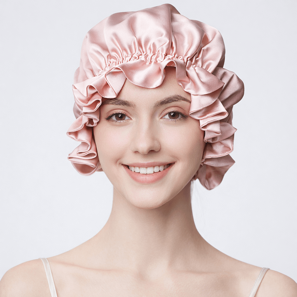 Woman wearing a pink silk bonnet on a light gray background