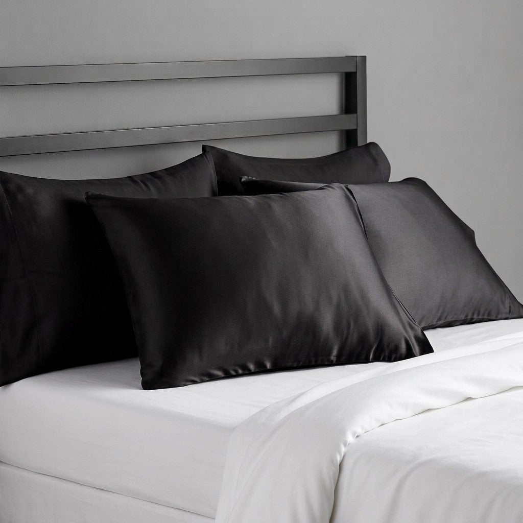 black mulberry silk pillowcases on bed