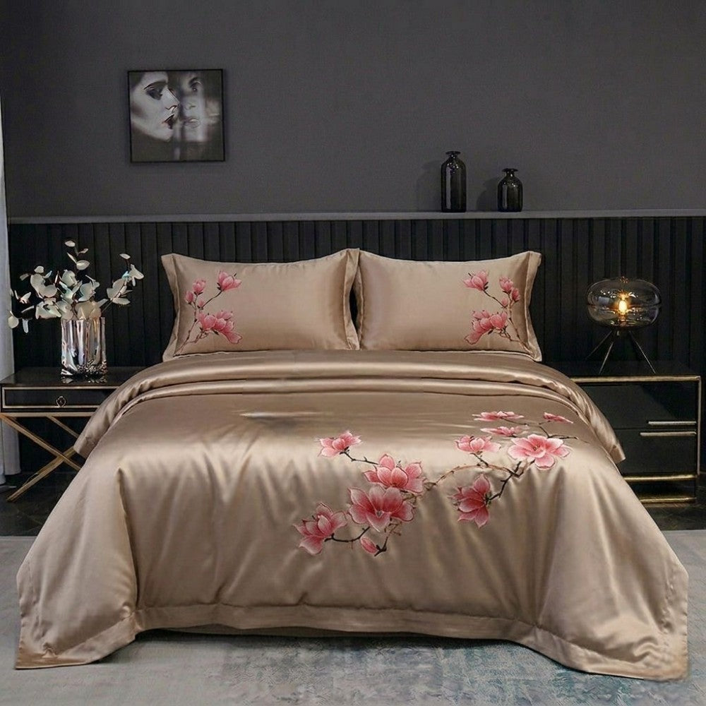 Beige floral bedding set on a bed in a bedroom setting.