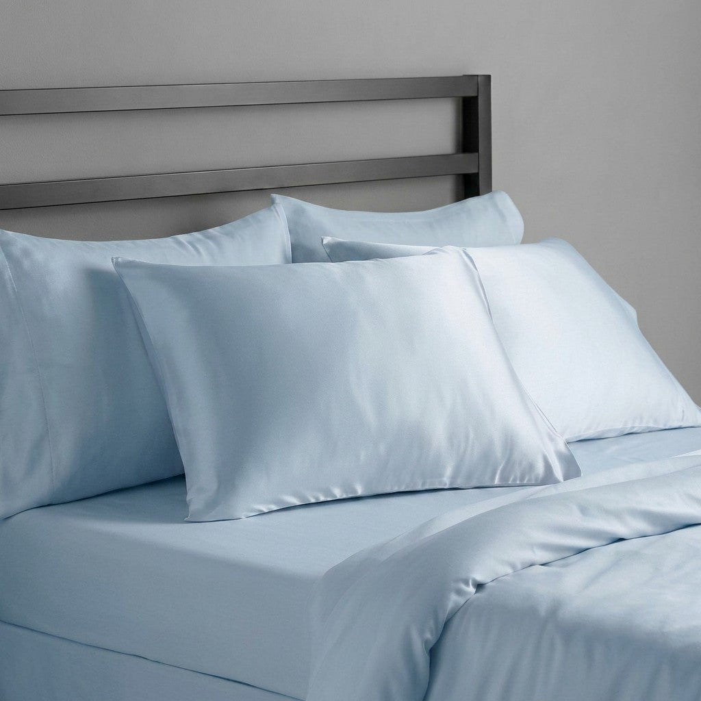 sky blue mulberry silk pillowcases on bed